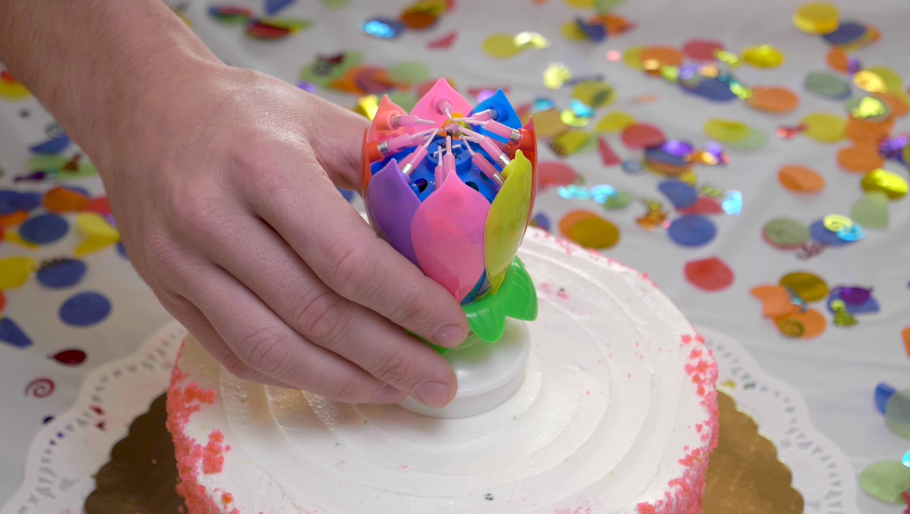 Watch the Awesome Blossom Birthday Candle 